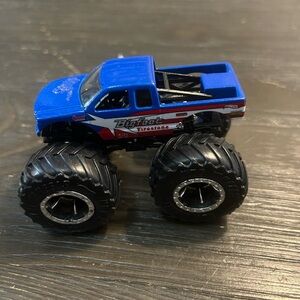 Blue and Black Monster Truck Toy with Oversized Wheels